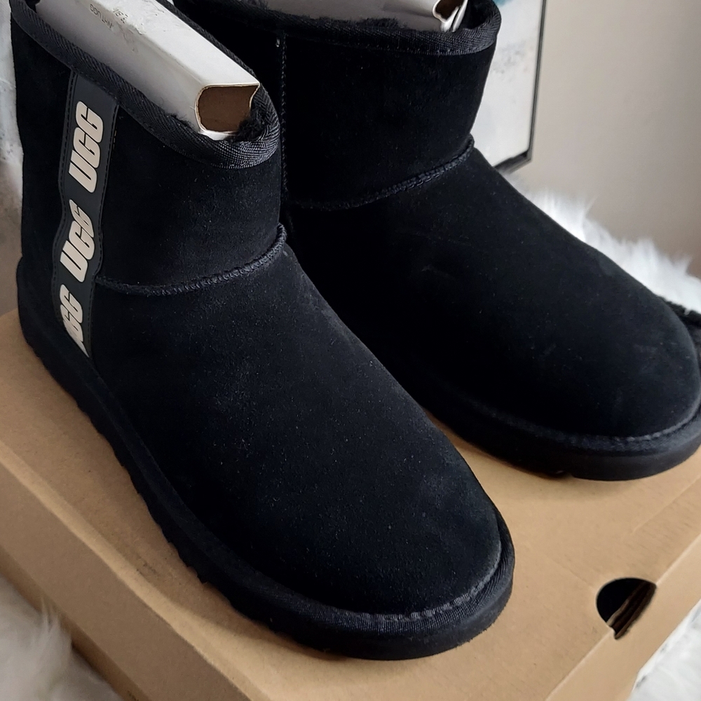Classic black mini with side logo, like new, size 10, only worn few times